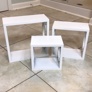 Wall shelves. These are cubed, white wall shelves.